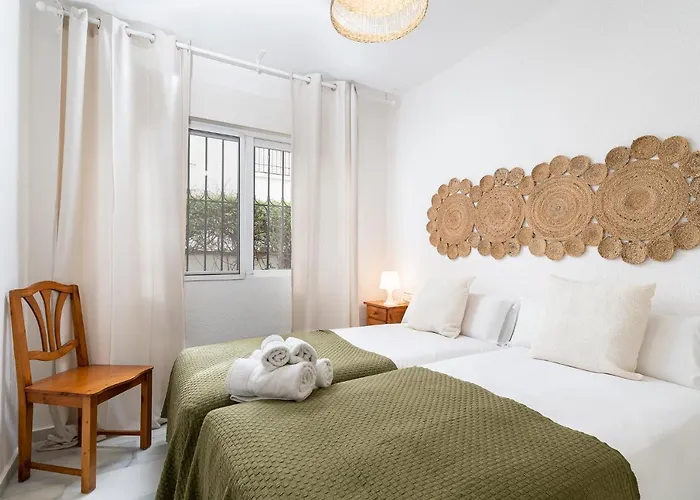 Jardines De Monko * 托雷莫利诺斯